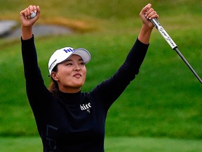 South Korea's Jin Young Ko celebrates after victory in the Evian golf championships at the French Alps town of Evian-les-Bains on July 28, 2019, a major tournament on the women's calendar.