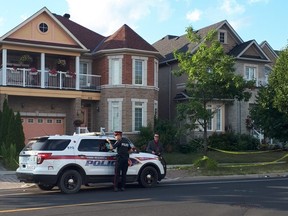 Police at the scene of a suspicious death investigation were four people were found dead inside a home on Castlemore Ave. in Markham.