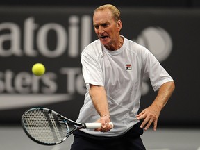 Peter McNamara of Australia in action during match against Mansour Bahrami of Iran and Andrew Castle of Great Britain on Day Two of the Statoil Masters Tennis at the Royal Albert Hall on Dec. 6, 2012 in London, England.