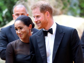 Prince Harry, Duke of Sussex and Meghan, Duchess of Sussex attend "The Lion King" European Premiere at Leicester Square on July 14, 2019 in London, England.