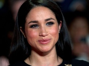 This file photo taken on Nov. 11, 2013 shows actress Meghan Markle on the red carpet for the world premier of the film "The Hunger Games: Catching Fire" in Leicester Square, London, England.