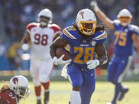 Running back Melvin Gordon of the Los Angeles Chargers makes a run against the Arizona Cardinals at StubHub Center on November 25, 2018 in Carson, California. (Sean M. Haffey/Getty Images)