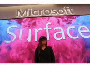 An employee uses an augmented reality headset at Microsoft's new Oxford Circus store ahead of its opening in London, Britain July 9, 2019.