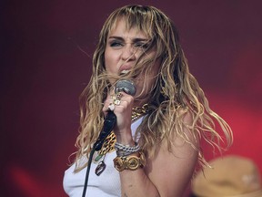 Miley Cyrus performs at the Glastonbury Festival on Worthy Farm near the village of Pilton in Somerset, England, on June 30, 2019. (OLI SCARFF/AFP/Getty Images)