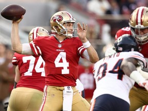 Nick Mullens of the 49ers looks to pass against the Bears during their NFL game at Levi's Stadium in Santa Clara, Calif., on Dec. 23, 2018.