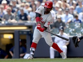 Phillies' Odubel Herrera hits a single against the Brewers at Miller Park in Milwaukee, Wis., on May 25, 2019.