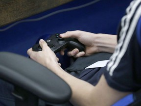 A student plays a video game in Sapulpa, Okla. on April 3, 2019.