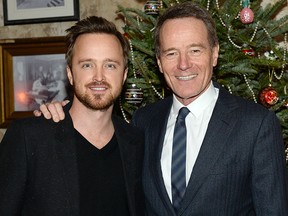 Aaron Paul (L) and Bryan Cranston attend a celebration for Bryan Cranston at House of Elyx on Dec. 13, 2015 in New York City.