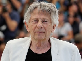 This file photo taken on May 27, 2017 shows French-Polish director Roman Polanski posing during a photocall for the film "Based on a True Story" (D'Apres une Histoire Vraie) at the 70th edition of the Cannes Film Festival in Cannes, southern France.