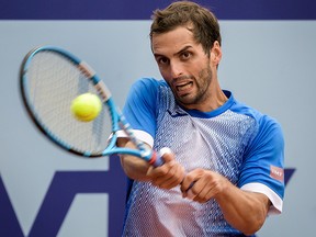 Spain's Albert Ramos-Vinolas returns a ball to Germany's Cedrik-Marcel Stebe during their men's single final match at the Swiss Open ATP tennis tournament on July 28, 2019, in Gstaad.
