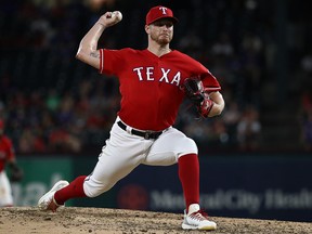 Shelby Miller of the Texas Rangers throws against the Cleveland Indians in the eighth inning at Globe Life Park in Arlington on June 19, 2019 in Arlington, Texas.