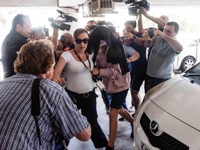 This picture taken on July 29, 2019 shows a British teenager who accused seven Israelis of gang rape arriving at the Famagusta District Court in Paralimni in eastern Cyprus, to face charges of making a false allegation. (IAKOVOS HATZISTAVROU/AFP/Getty Images)