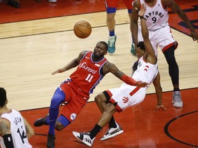 Philadelphia 76ers James Ennis III SF crashes into Toronto Raptors Kawhi Leonard SF during the third quarter in Toronto, Ont. on Monday May 13, 2019.