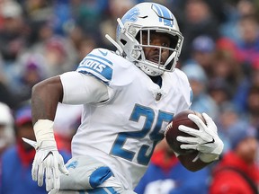 Theo Riddick of the Detroit Lions carries the ball in the second quarter during NFL game against the Buffalo Bills at New Era Field on Dec. 16, 2018 in Buffalo, N.Y.