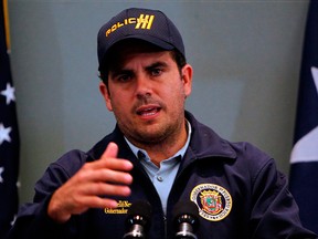 In this file photo taken on Sept. 24, 2017, Puerto Rico's Governor Ricardo Rossello speaks to the media during a press conference in San Juan, Puerto Rico.