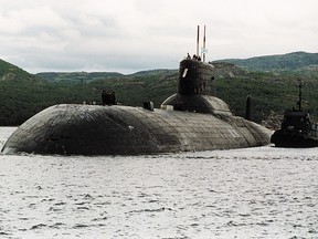 The Russian nuclear submarine "Akula" (Shark) prepares to dock at the military port of Murmansk, northern Russia, 23 July 2000.