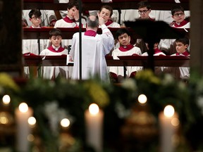 The choir of Sistine Chapel is seen before the arrival of Pope Francis to lead the Feast of the Presentation of the Lord mass in Saint Peter's Basilica at the Vatican February 2, 2017. (REUTERS/Alessandro Bianchi/File Photo)