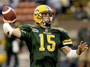 Edmonton Eskimos' quarterback Ricky Ray throws a pass against the Saskatchewan Roughriders during first half CFL action in Edmonton August 11, 2006.