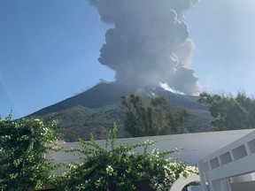 Ash rises after a volcano eruption in Stromboli, Italy, Wednesday, July 3, 2019 in this image obtained from social media.