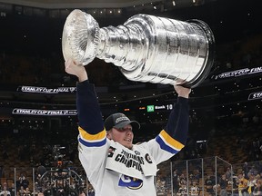 Oskar Sundqvist of the St. Louis Blues holds the Stanley Cup following the Blues victory over the Boston Bruins at TD Garden on June 12, 2019 in Boston.