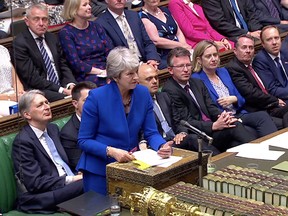 British Prime Minister Theresa May takes questions in Parliament on her last day in office in London July 24, 2019, in this screen grab taken from video. (Reuters TV via REUTERS)