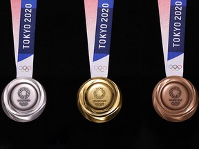 This undated handout photograph released on July 24, 2019 by Tokyo 2020 shows the back side of medals for the Tokyo 2020 Olympic Games in Tokyo. (Handout/Tokyo 2020 AFP)