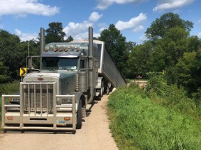 A bridge built in 1906 collapsed Monday after a truckload well over the bridge's carry capacity drove across it. (Grand Forks County Sheriff’s Office)