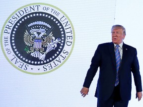 President Donald Trump takes the stage next to an altered presidential seal prior to a speech at Turning Point USA's Teen Student Action Summit in Washington, U.S., July 23, 2019. ( REUTERS/Jonathan Ernst/File Photo)