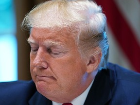 U.S. President Donald Trump speaks to the press after signing a bill for border funding legislation in the Oval Office at the White House in Washington, D.C., on July 1, 2019.