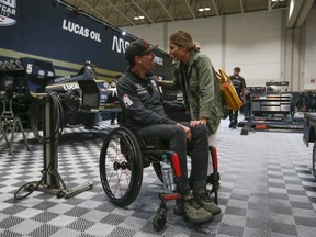 IndyCar driver Robbie Wickens, of Guelph, in the Arrow team paddock with his fiancé Karli. Wickens talked about his recovery process after a horrific crash at the Supply 500 race at the Pocono Speedway in August 2018 that left him a paraplegic. And now he will be the pace car driver, in a modified Acura NSX, at this year's Honda Indy race in Toronto, Ont. on Friday July 12, 2019.