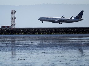 A United Airlines Boeing 737 lands at San Francisco International Airport on April 24, 2019 in San Francisco.