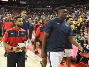 Members of the New Orleans Pelicans including Zion Williamson leave the court after an earthquake shook the Thomas & Mack Center during a game against the New York Knicks during the 2019 NBA Summer League on July 5, 2019 in Las Vegas.