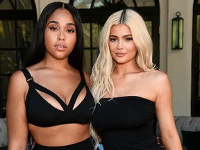 Jordyn Woods (L) and Kylie Jenner attend the launch event of the activewear label SECNDNTURE by Jordyn Woods at a private residence on Aug. 29, 2018 in West Hollywood, Calif.