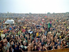This handout photo by Elliott Landy shows the crowd  at the original Woodstock festival in Bethel, New York in August 1969.