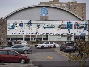 Toronto police respond to a bomb threat at St. Michael's College School, in Toronto on November 19, 2018. Charges against one of seven students accused in alleged incidents of sexual assault and assault at a prestigious private school in Toronto were withdrawn Wednesday after a prosecutor said a conviction was unlikely. (THE CANADIAN PRESS/Tijana Martin)