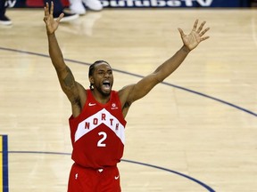 Kawhi Leonard #2 of the Toronto Raptors celebrates his teams win over the Golden State Warriors in Game Six to win the 2019 NBA Finals at ORACLE Arena on June 13, 2019 in Oakland, California.