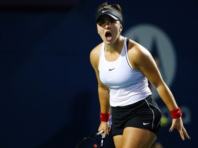 Bianca Andreescu celebrates a point against Eugenie Bouchard during in a first round match on Day 4 of the Rogers Cup at Aviva Centre on August 6, 2019 in Toronto. (Vaughn Ridley/Getty Images)