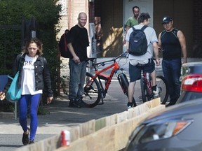 Residents in Toronto's Augusta Ave.-Queen St. W. area complain about dirty needles and other problems around a respite centre in the neighbourhood. (Stan Behal, Toronto Sun)