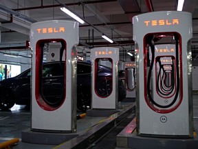 Tesla Superchargers are pictured in a parking lot in Suzhou, Jiangsu province, China August 4, 2019. (REUTERS/Aly Song)