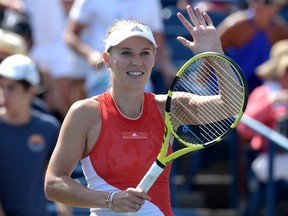 Caroline Wozniacki salutes fans after winning her first round match against Yulia Putintseva  during the Rogers Cup tennis tournament at Aviva Centre. (Dan Hamilton-USA TODAY Sports)