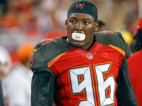 Tampa Bay Buccaneers defensive end Ryan Russell on the bench during the second half of an NFL football game at Raymond James Stadium. (Reinhold Matay-USA TODAY Sports)