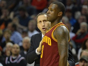 Head coach David Blatt of the Cleveland Cavaliers speaks with Dion Waiters #3 of the Cleveland Cavaliers during the second quarter of the game against the Portland Trail Blazers at Moda Center on November 4, 2014 in Portland, Oregon.