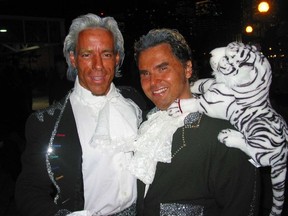Siegfried and Roy - with a furry pal.
