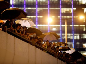 Anti-extradition bill protesters participate in a march to demand democracy and political reforms in Hong Kong, China, August 18, 2019. (REUTERS/Kim Hong-Ji)