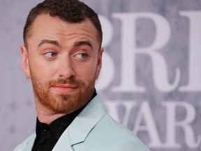 British singer-songwriter Sam Smith poses on the red carpet on arrival for the BRIT Awards 2019 in London on Feb. 20, 2019.