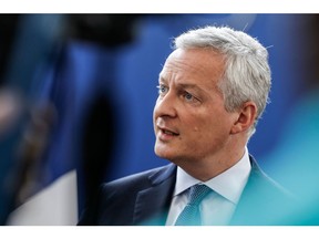 French Economy Minister Bruno Le Maire addresses journalists at his ministry in Paris on July 27, 2019 a day after US President vowed "substantial" retaliation against France for a tax targeting US tech giants, threatening to slap tariffs on French wine and blasting French President's "foolishness."