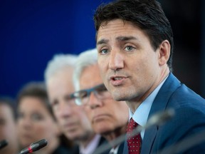 In this file photo taken on July 18, 2019 Canadian Prime Minister Justin Trudeau speaks during the Canada-EU Summit in Montreal.