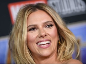 In this file photo taken on July 20, 2019 US actress Scarlett Johansson arrives on stage for the Marvel panel in Hall H of the Convention Center during Comic Con in San Diego, California.