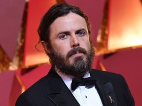 This file photo taken on February 26, 2017 shows nominee for best actor in "Manchester By The Sea" Casey Affleck as he arrives on the red carpet for the 89th Oscars in Hollywood, California.