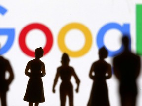 Small toy figures are seen in front of Google logo in this illustration picture, April 8, 2019.